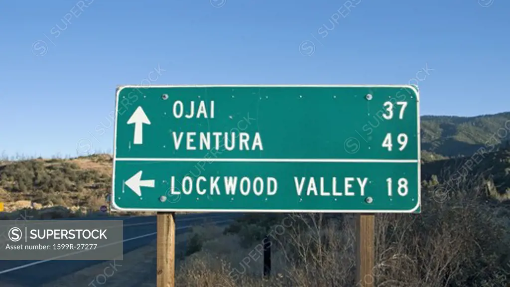 California road sign pointing to Ojai, Ventura and Lockwood Valley, California off highway 33