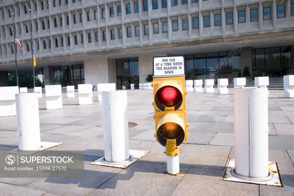 Security barriers warn drivers of risk in front of Federal Building, Washington D.C.