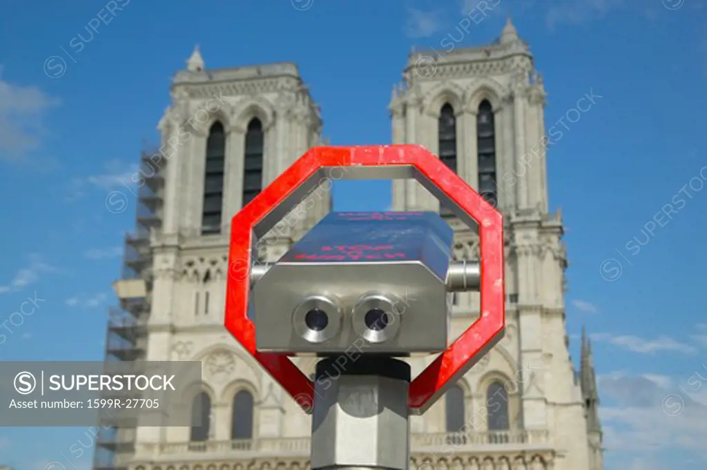 Binoculars pointed at Notre Dame Cathedral, Paris, France