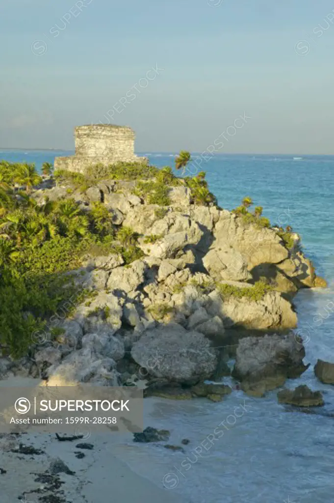 Templo del Dios del Viento Mayan ruins of Ruinas de Tulum (Tulum Ruins) in Quintana Roo, Yucatan Peninsula, Mexico. The turquoise waters of the Caribbean Sea and beach to the right.
