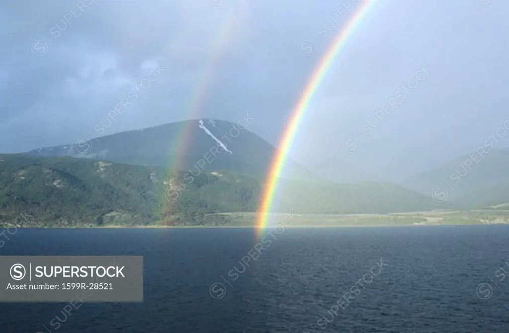 Double rainbow over ocean at Ushuaia, Tierra del Fuego National Park and Andes Mountains, Argentina