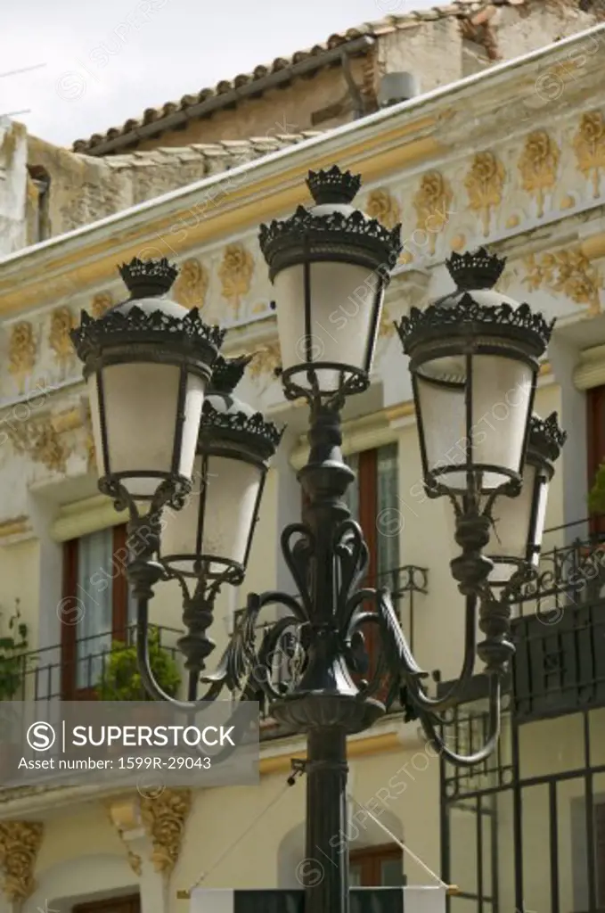 Rod iron street lamps of Avila Spain, an old Castilian Spanish village