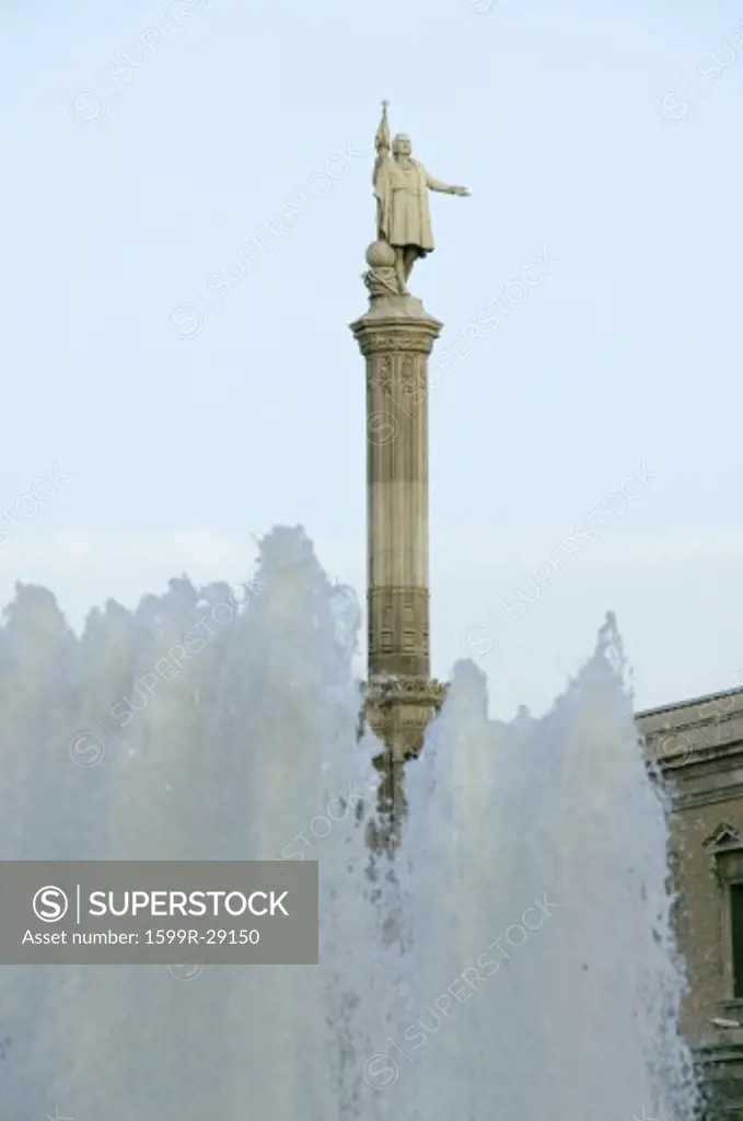 Water fountain and statue of Christopher Columbus at Plaza de Colón in Madrid, Spain
