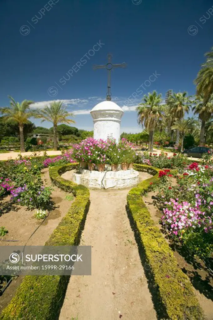 Gardens of 15th-century Franciscan Monasterio de Santa María de la Rábida, Palos de la Frontera, a Heritage of Mankind Site in the Huelva Provence of Andalucia and Southern Spain, the seaside spot where Christopher Columbus planned and departed from the Old World to the New World in August 3 of 1492