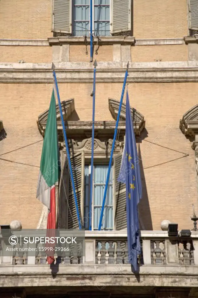 Italian and European Flag hanging from antique building in Rome, Italy, Europe