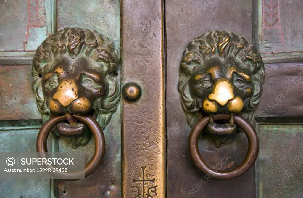 Sant'Andrea Church door knockers in Amalfi, Italy, Europe, a town in the province of Salerno, in the region of Campania, Italy, on the Gulf of Salerno, 24 miles southeast of Naples