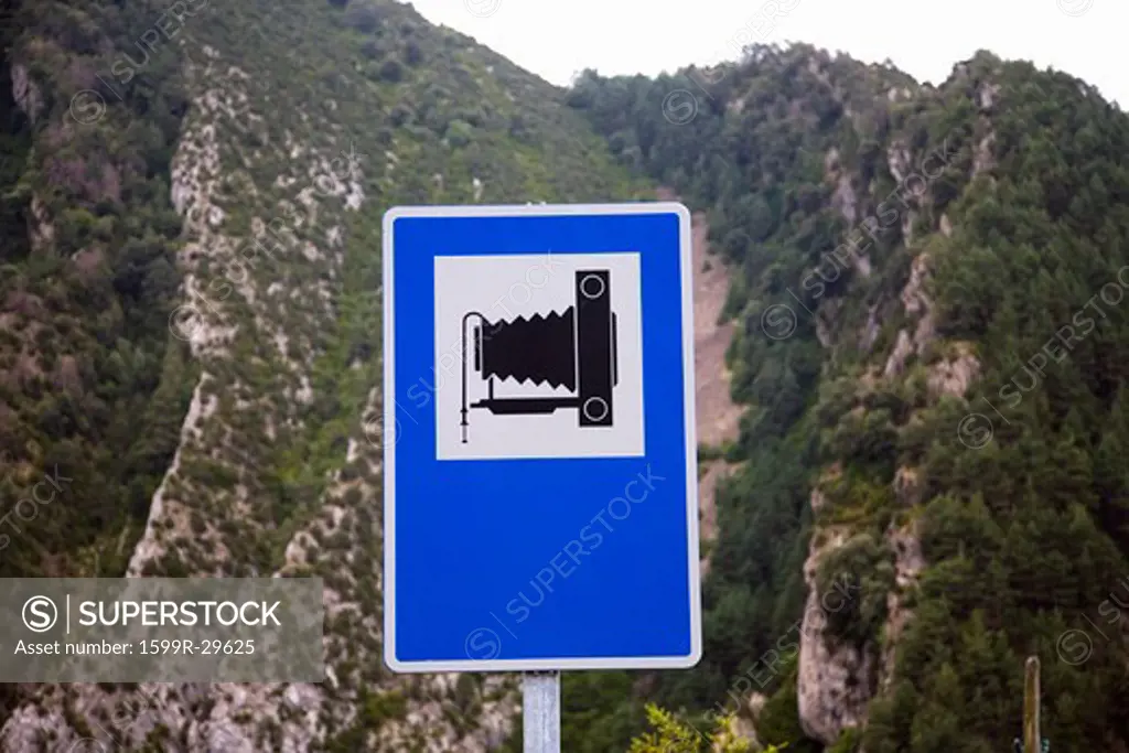 Road sign with 8 x 10 camera to indicate Picture Spot near Ainsa, Huesca, Spain in Pyrenees Mountains