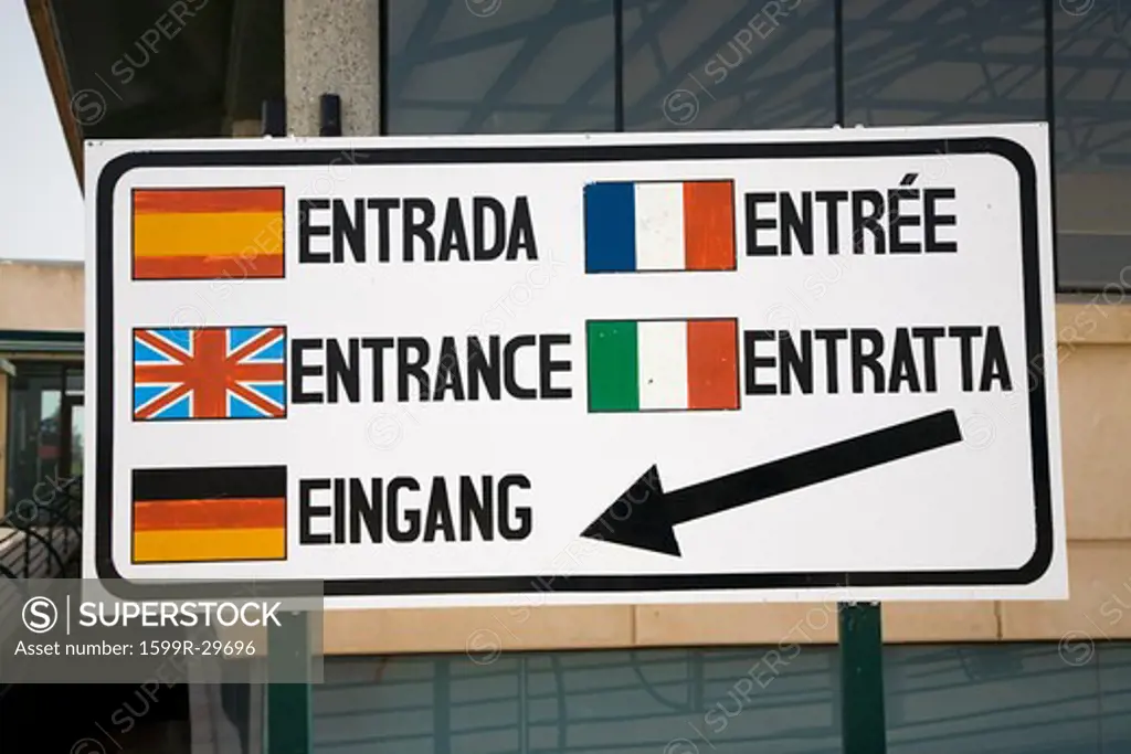 Multi-language sign in Europe saying ''Entrance'' in Spanish, English, Italian, German and French