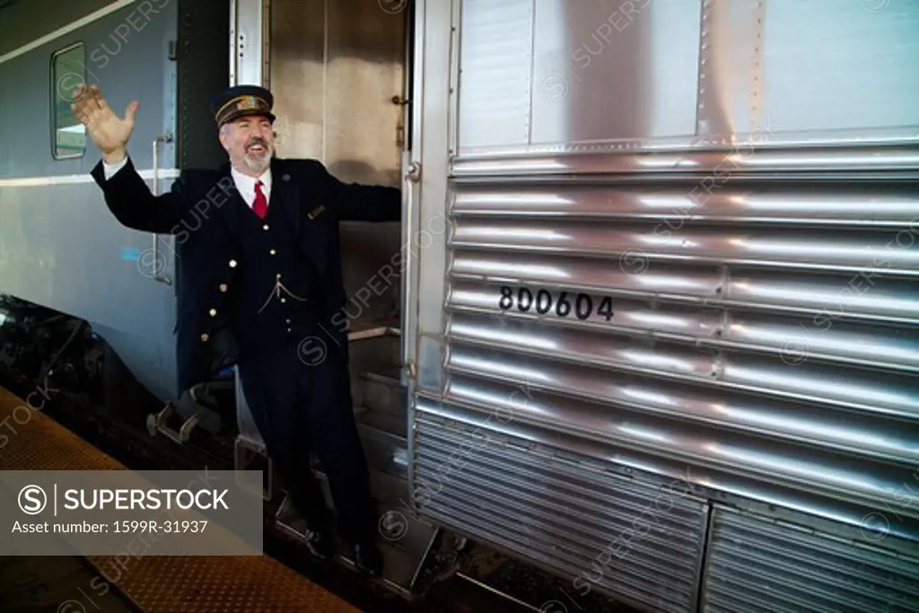 Conductor says 'All Aboard' on Pearl Harbor Day Troop train reenactment from Los Angeles Union Station to San Diego