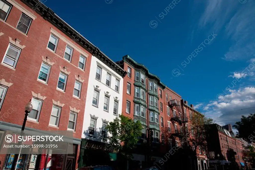 Red brick building fronts on Hanover Street, historic North End, Italian section of Boston, MA