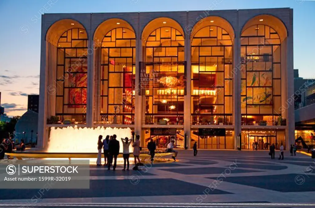Lincoln Center at dusk, with crowds in front of water fountains, New York, New York