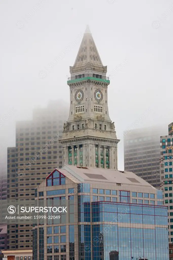 Commerce House Tower (built 1910) and Boston Skyline in deep fog, Boston, MA