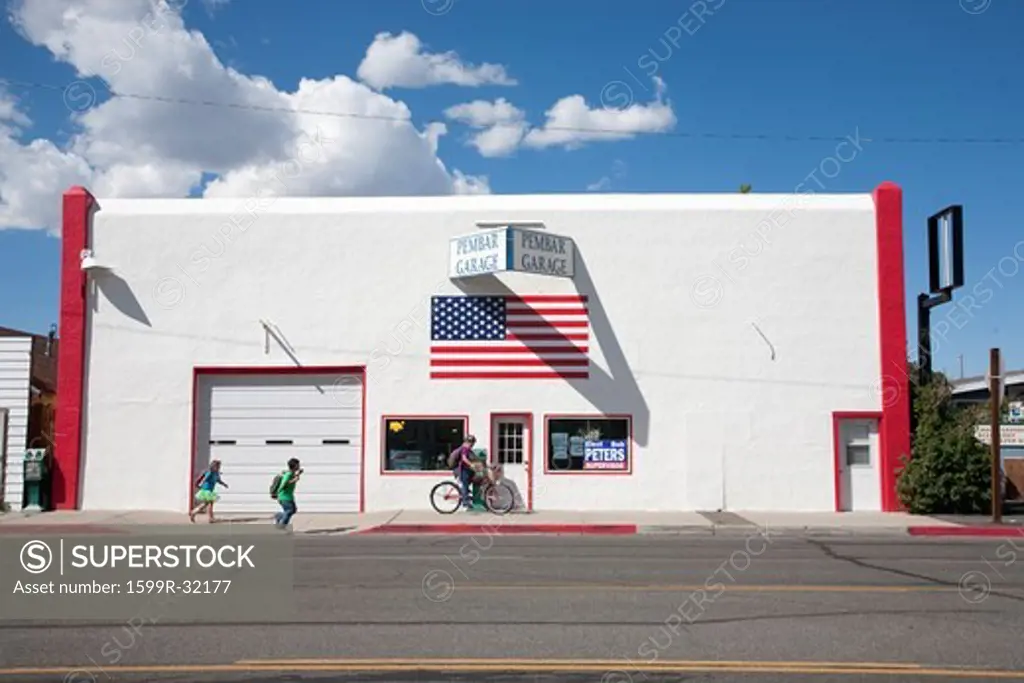 Kids come home from school in front of, 'Pembar Garage', Bridgeport, CA