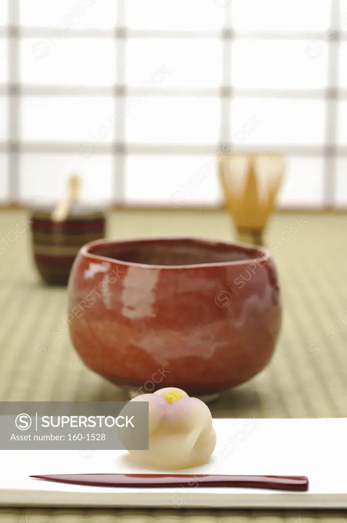 Japanese tea cup and teacake in tea ceremony