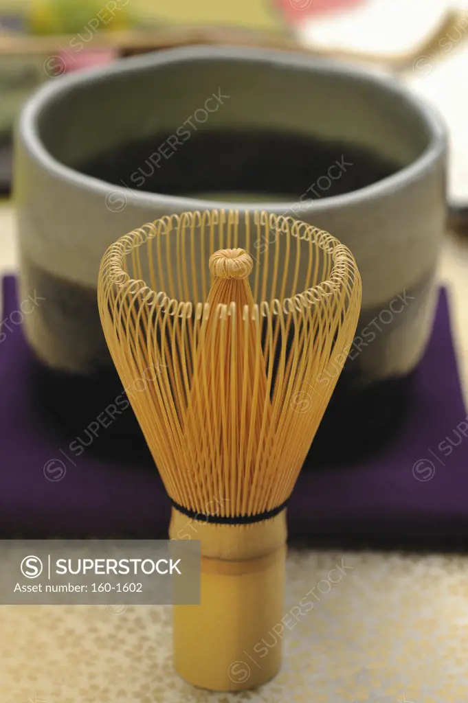 Tea whisk with a Japanese tea cup