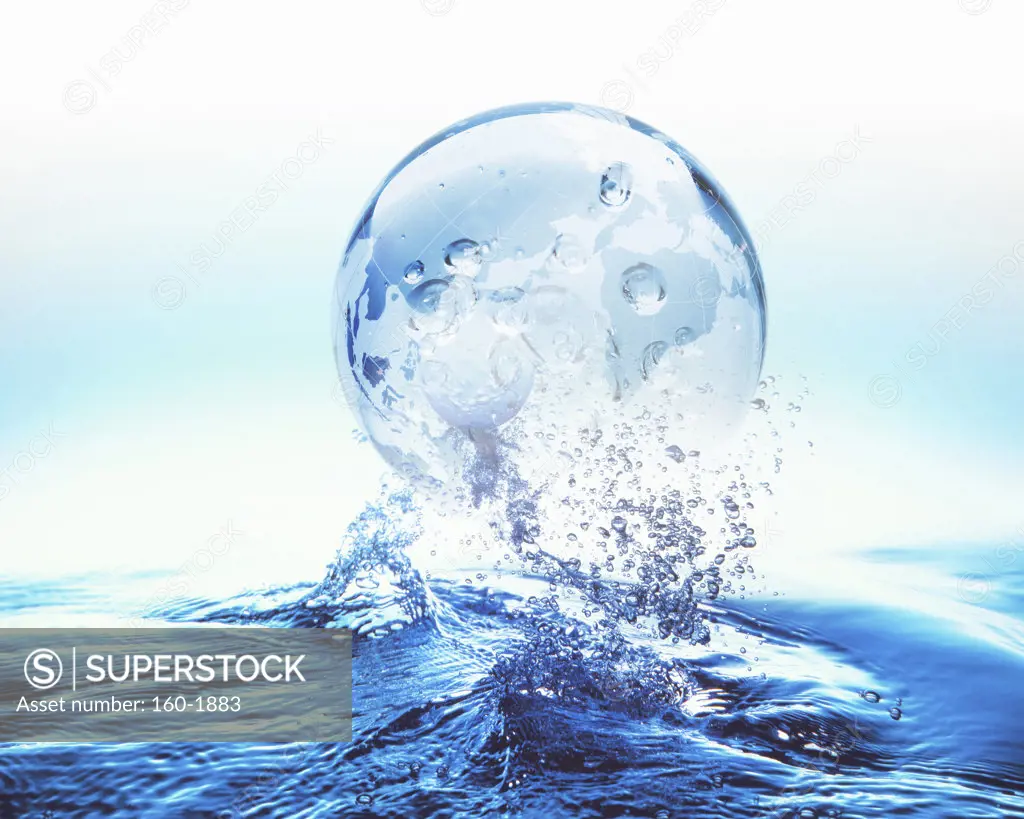 Globe on surface of water, digitally generated image