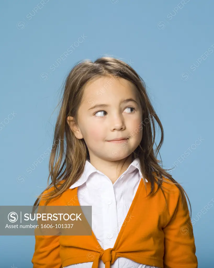 Portrait of little girl looking away