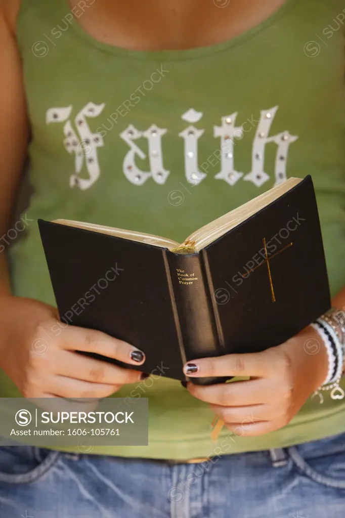 France, Haute Savoie, Saint-Gervais, Young christian reading the bible