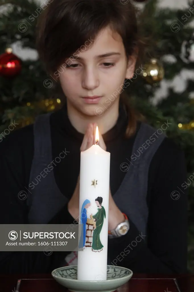 France, Hauts-de-Seine, Montrouge, Girl with Advent candle