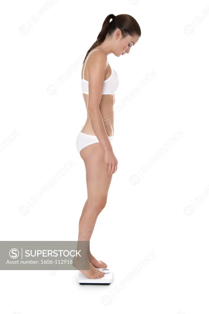 Woman in underwear on scales