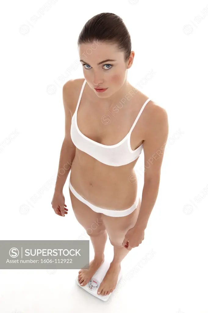 Woman in underwear on scales