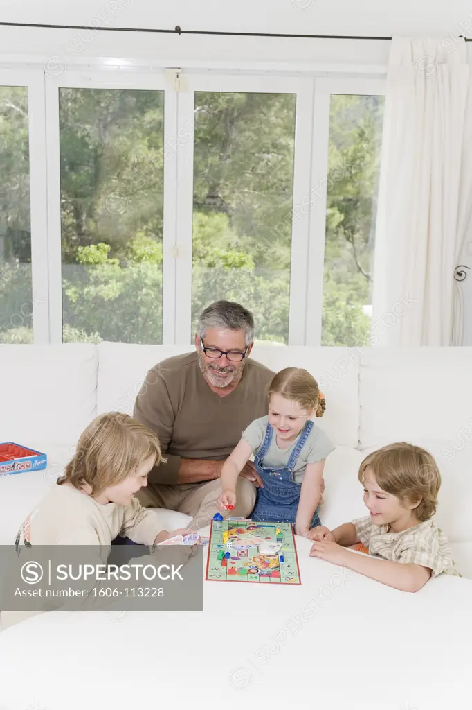 Family playing monopoly