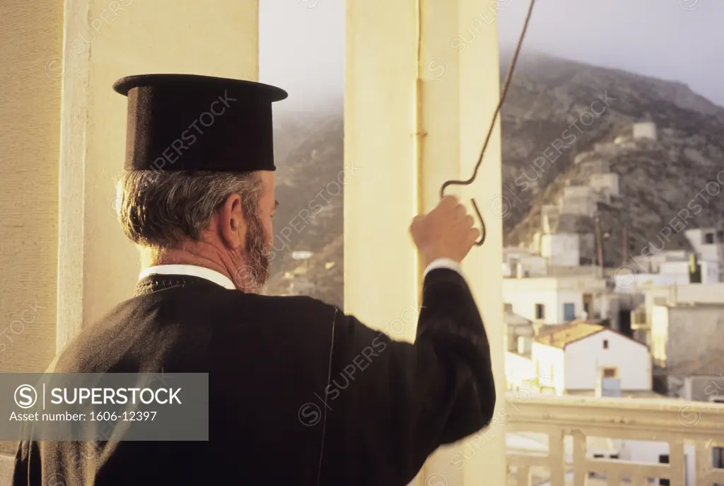 Greece, Aegean islands, Carpathos island, pope ringing the bell