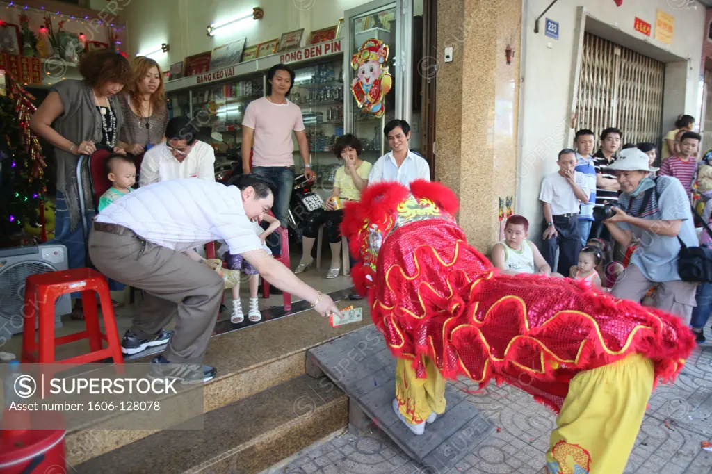 Vietnam, Ho Chi Minh City, Chinese New Year. Lion dance performers. Vietnam.