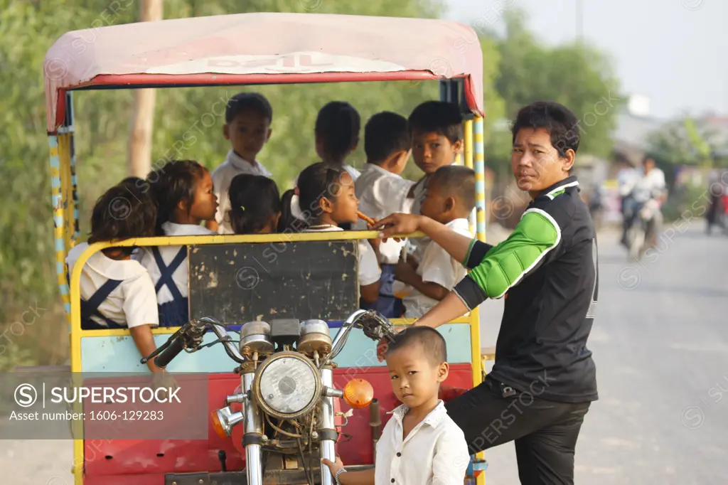 Cambodia, Siem Reap, Siem Reap. Tuk Tuk driver.  Cambodia.