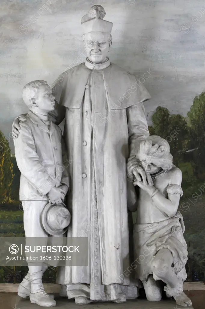 Italy, Piedmont, Turin. Statue depicting Don Bosco in Santuario di Maria Ausiliatrice, Valdocco  Italy.