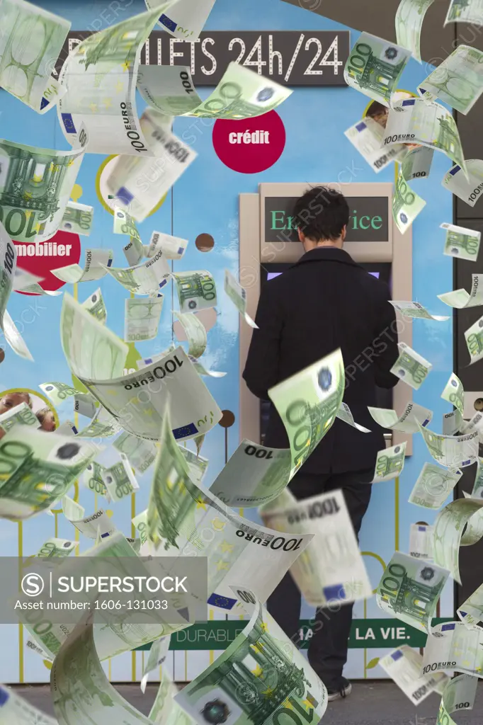 100 euro bills flying behind a man at ATM