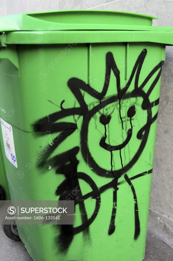 France, Paris, graffitis on dustbin