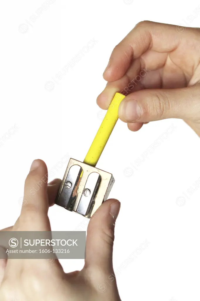 Man sharpening pencil