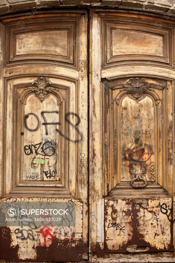 France, Ile-de-France, Paris. Tagged wooden door Paris. France.