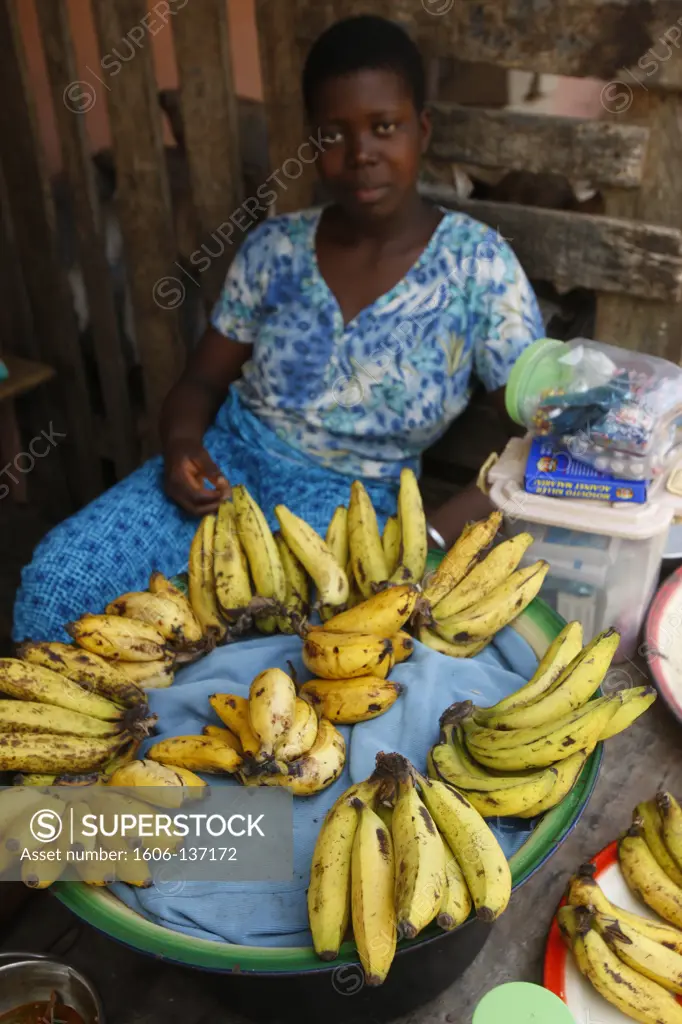 Togo, Lomé. Banana vendor Togo.