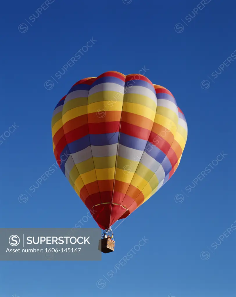 USA, New Mexico, Albuquerque, Colourful Hot Air Balloon in Sky