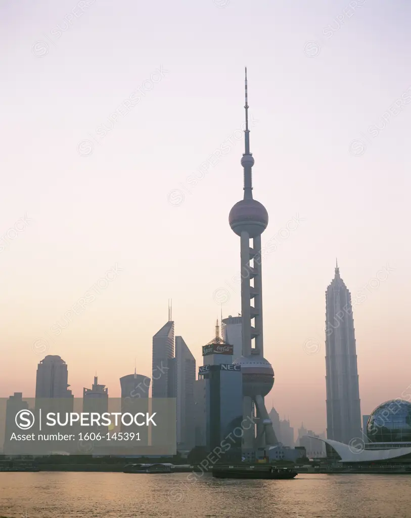China, Shanghai, Pudong Skyline / Oriental Pearl Tower & Skyscrapers / Huangpu River / Sunrise