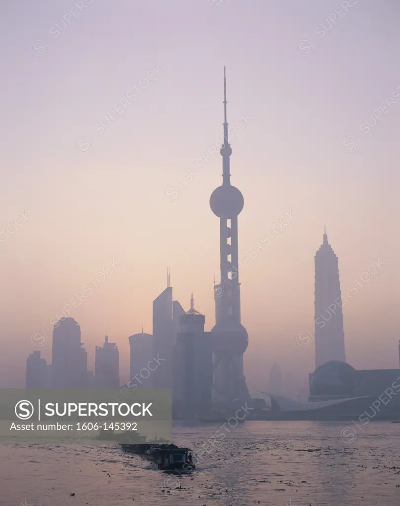 China, Shanghai, Pudong Skyline / Oriental Pearl Tower & Skyscrapers / Huangpu River / Sunrise