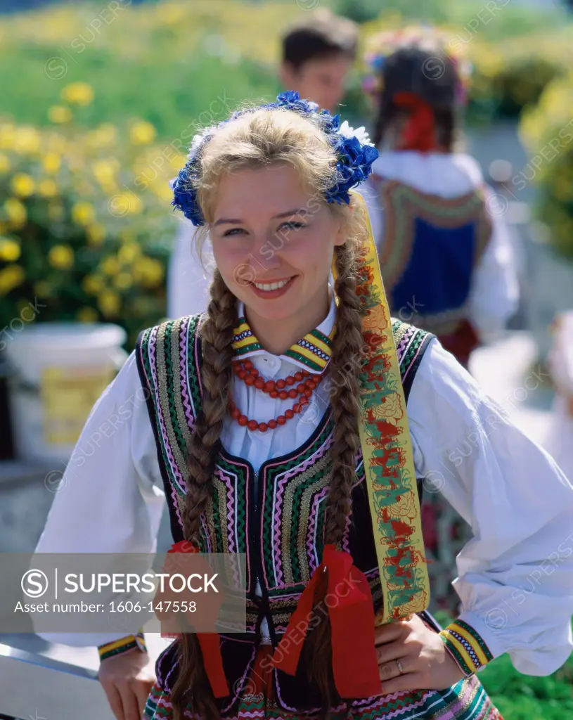 Poland, Warsaw, Girl Dressed in Traditional Polish Costume