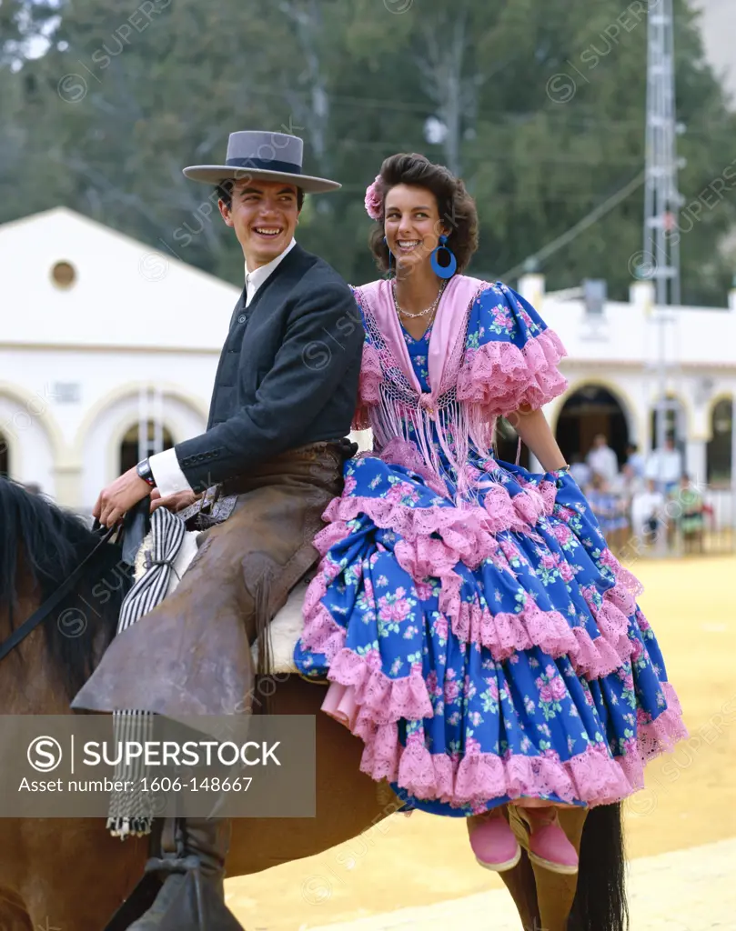 Spain, Andalusia, Jerez de la Frontera, Fiesta / Horse Fair / Couple Dressed in Andalucian Costume