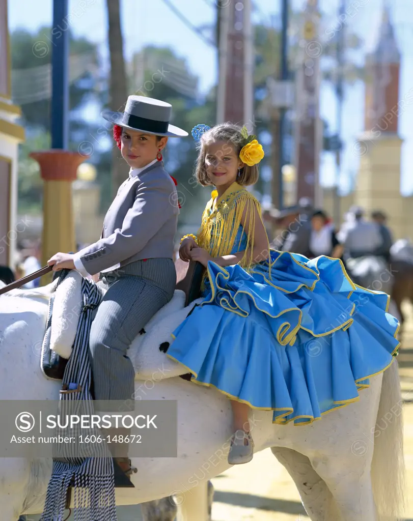 Spain, Andalusia, Jerez de la Frontera, Fiesta / Horse Fair / Girls Dressed in Andalucian Costume