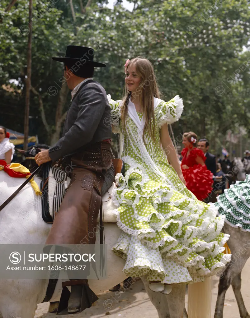 Spain, Andalusia, Jerez de la Frontera, Fiesta / Horse Fair / Couple Dressed in Andalucian Costume