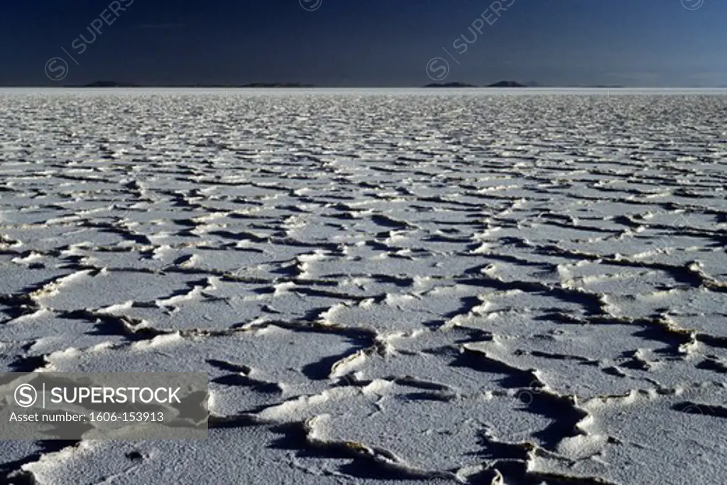 Bolivia, Salar de Uyuni, dried up salt lake , blue sky in the horizon