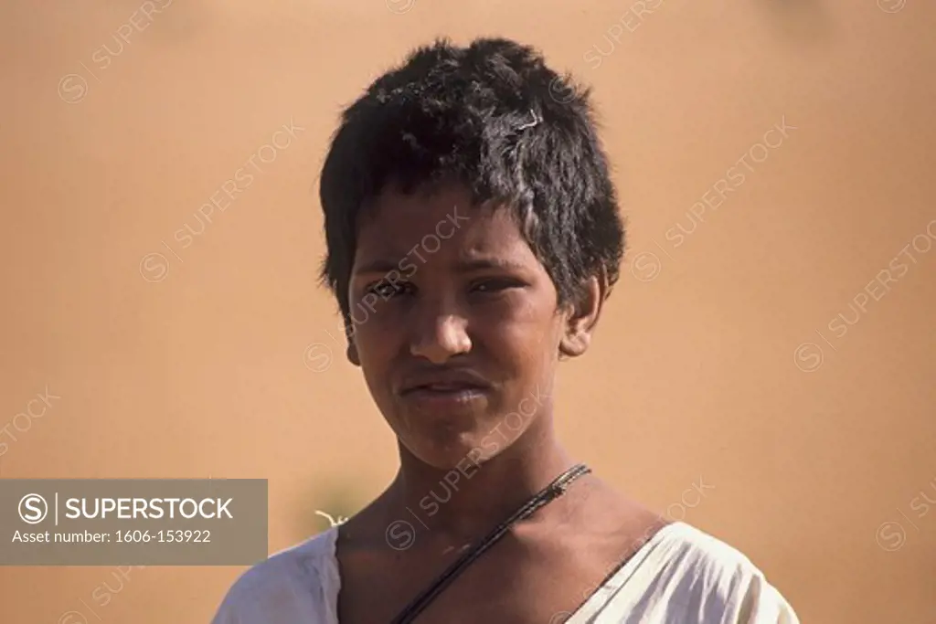 Mauritania, portrait of a boy Maurer, desert and sand