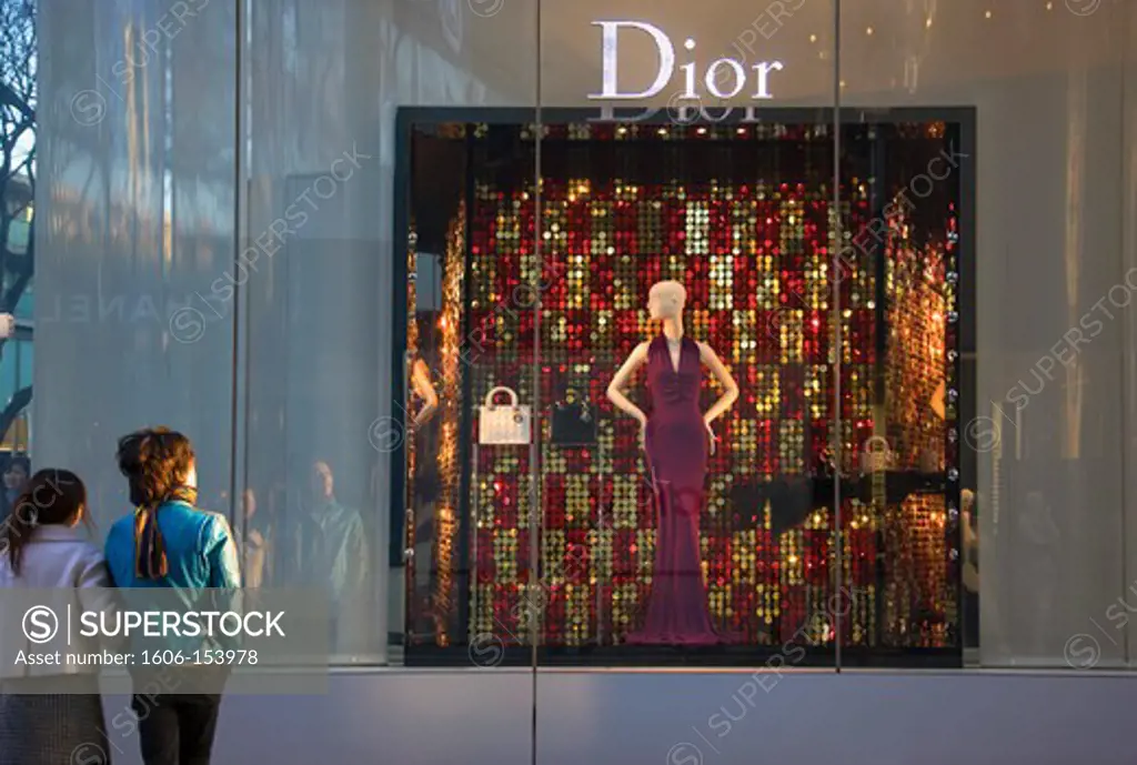 The afternoon sun illuminates the exterior of the Christian Dior boutique on Omotesando Avenue in the trendy yet upscale Harajuku District of Tokyo, Japan.