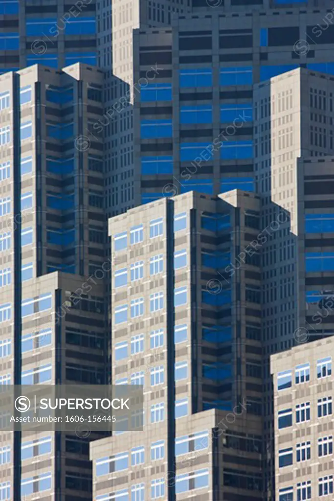 Morning sunlight emphasizes the architectural details of Tokyo City Hall, Tokyo Metropolitan Government Office Building 2, in the Shinjuku District of Tokyo, Japan.