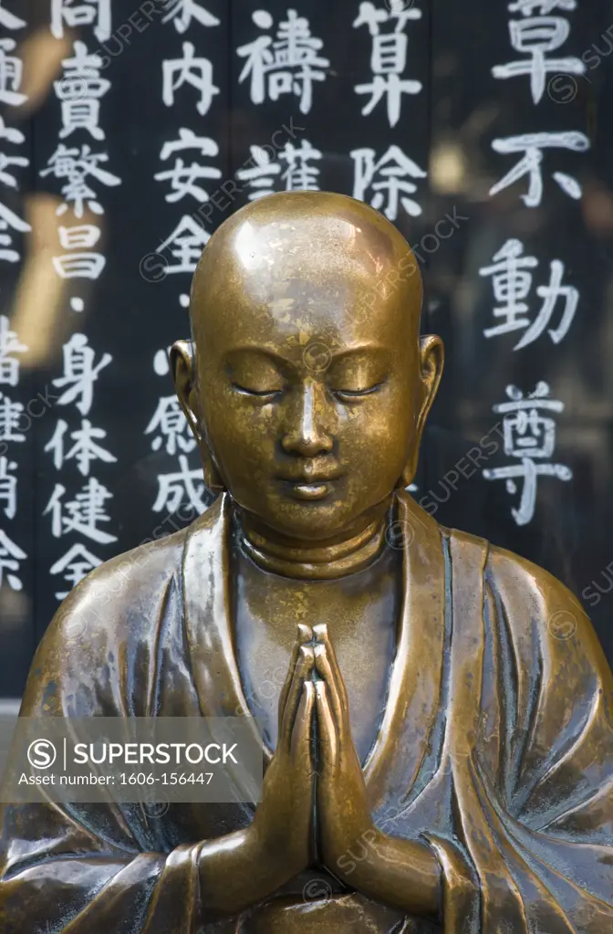 A detailed view reveals the beautiful bronze sculpturing of a Nadebotoke (Rubbing Buddha) Jizo statue, which worshippers may rub for good health, at Sensoji Temple (also known as Asakusa Kannon Temple) in Asakusa, located in the old shitamachi downt ...