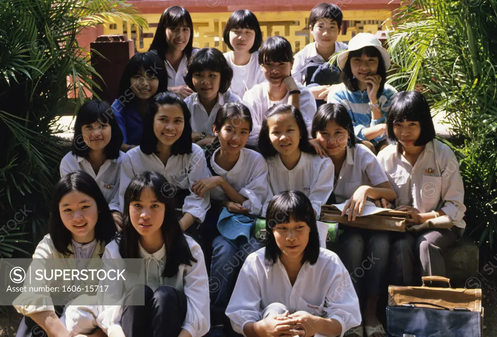 Vietnam, Hue, class of young school girls, posing, wearing white shirts,