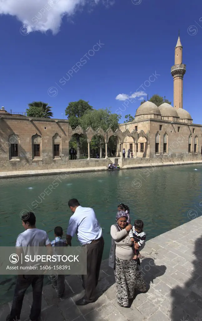 Turkey, Sanliurfa, Gölbasi, Rizvaniye Mosque, Balikli Göl pool, people,
