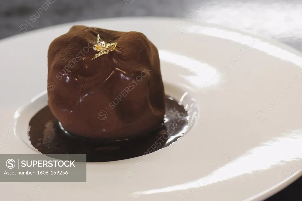 France, 68, Chocolate dessert with gold leaf in the restaurant Le Chambard in Kaysersberg